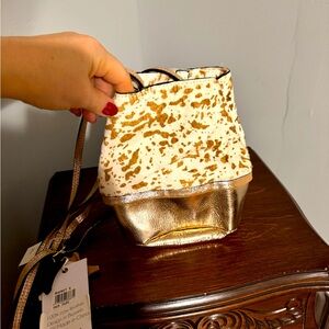 NWT Cow Print  and metallic leather bucket bag